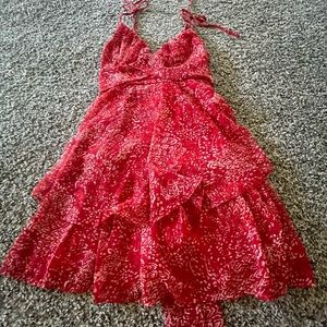this is a red mini dress it is in perfect condition size is xxs